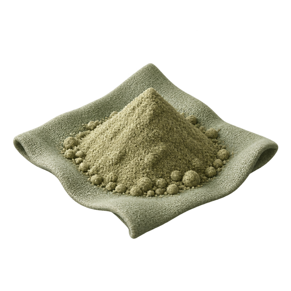 Small mound of fine kava powder on a sage-green cloth